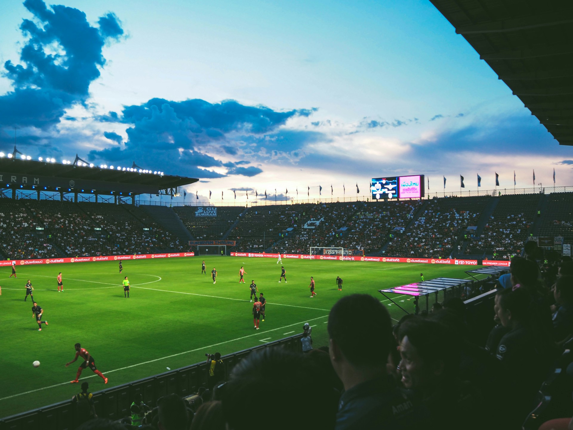 Sokkerspelers tydens 'n opwarmoefening